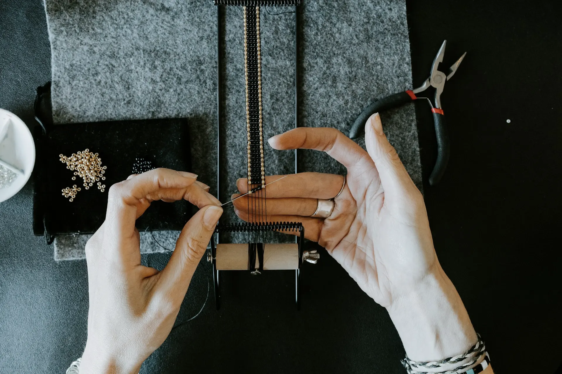 Industry context: Jewellery work at a bench.