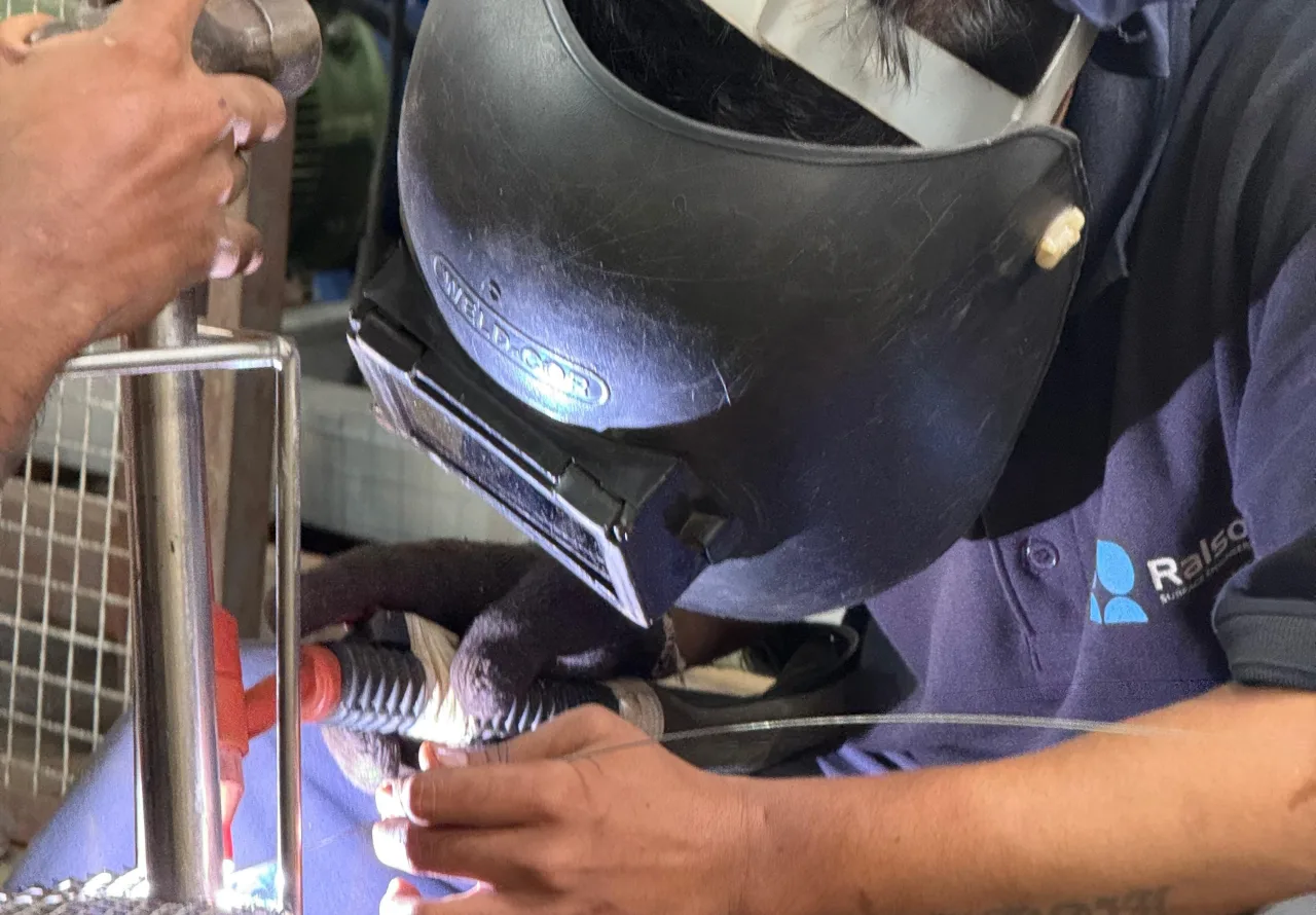 A Ralsonics welder fabricating a stainless steel assembly